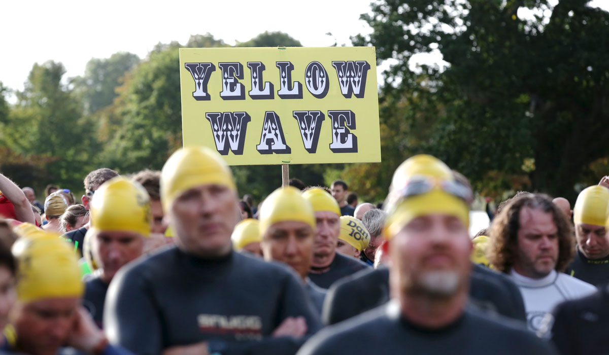 Yellow Wave sign at the start of the Dart 10k open water swim