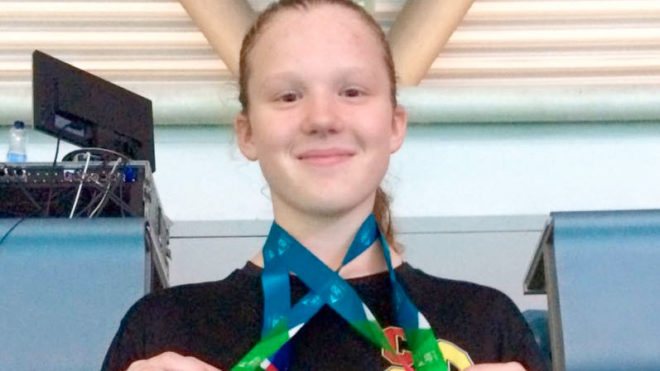 Hat-trick for Herron in day two finals