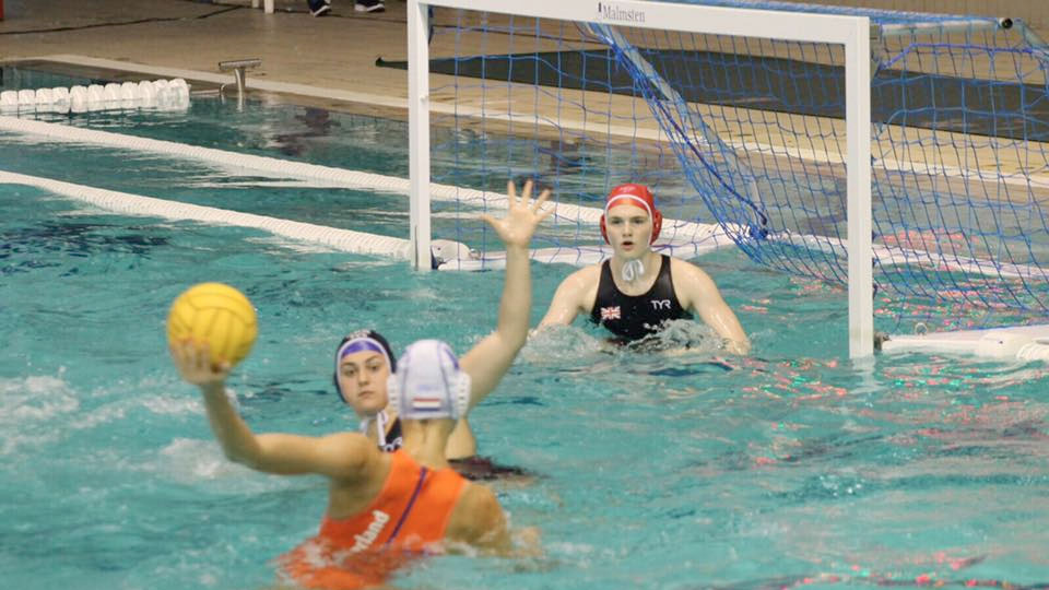 British goalkeeper Sophie Jackson watches a Dutch attack prepare to shoot at the European Junior Water Polo Championships 2017