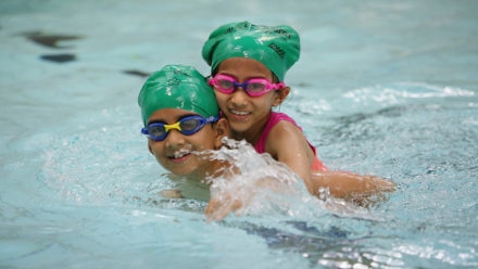 Swimming industry urges families to put down the screens and pick-up their goggles