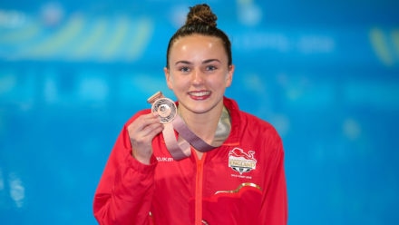 Toulson makes history with platform medal