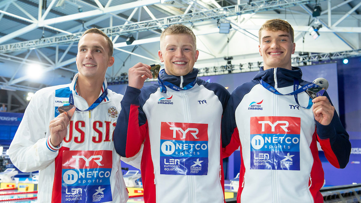 Adam Peaty and James Wilby hold their European 100m Breaststroke medals