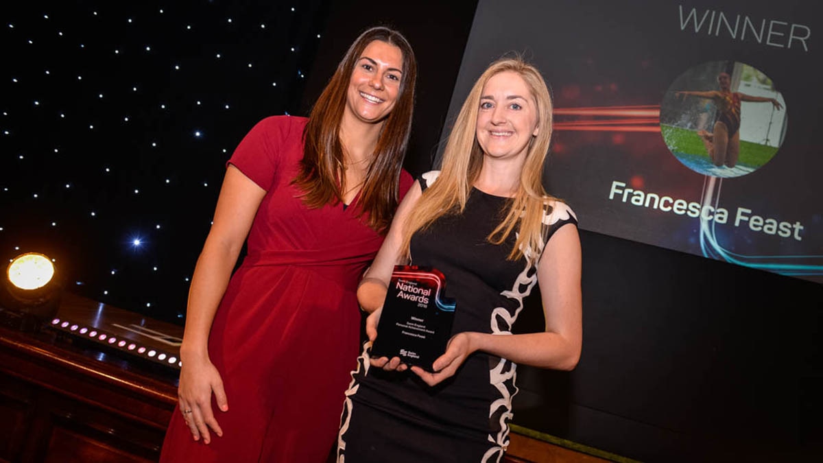 Francesca Feast receives her wim England Personal Achievement Award from Aimee Willmott