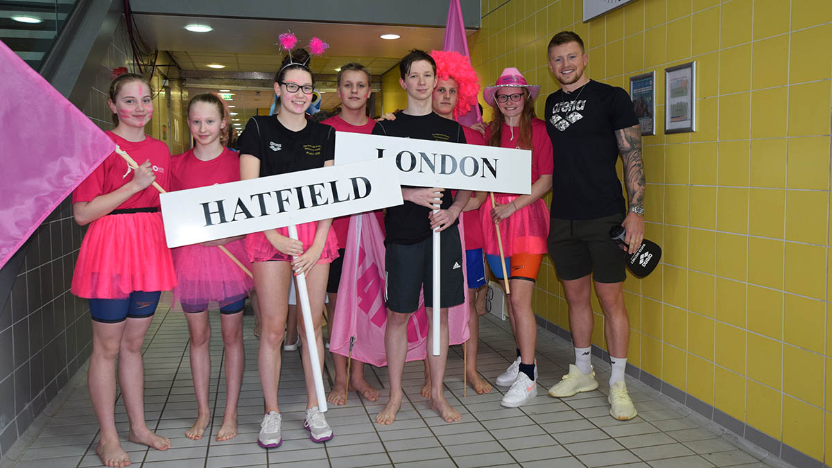 Adam Peaty greets Hatfield representatives before the grand parade ahead of the 50th National Arena League Cup Final in Cardiff