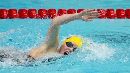 Crisp swim from Leah as she shatters personal best to take gold