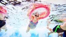 How does swimming affect common skin conditions