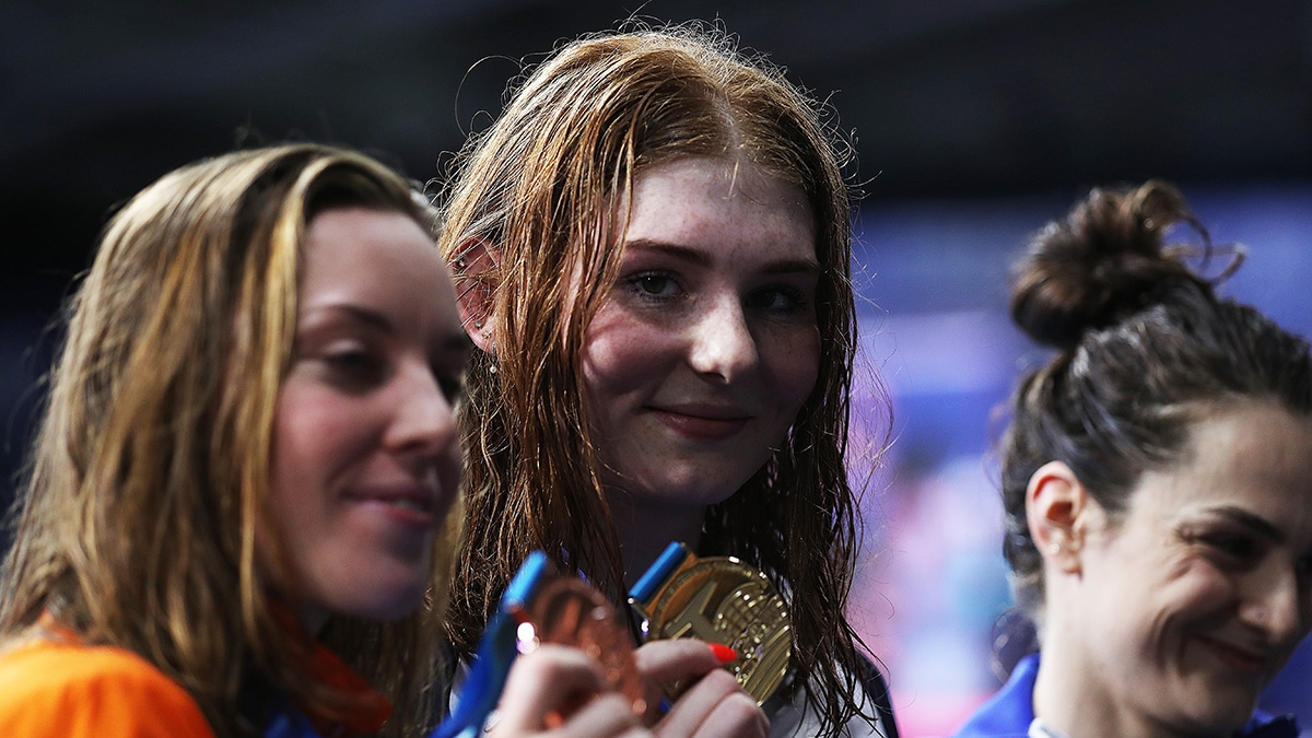 Freya Anderson is all smiles after getting presented with her first solo international gold medal