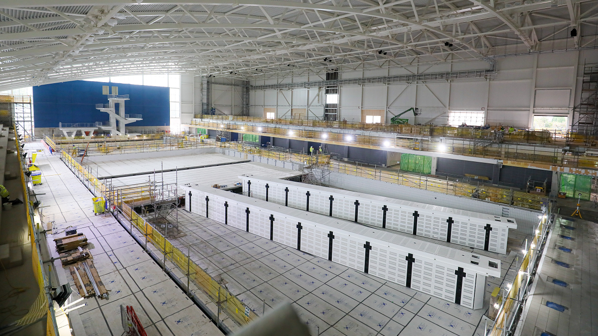 Inside the Sandwell Aquatics Centre after tiling of swimming and diving pools completed