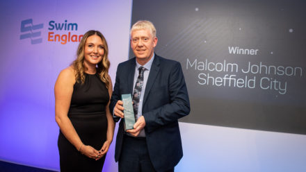 Malcolm Johnson thanks his students after winning Swim Teacher of the Year