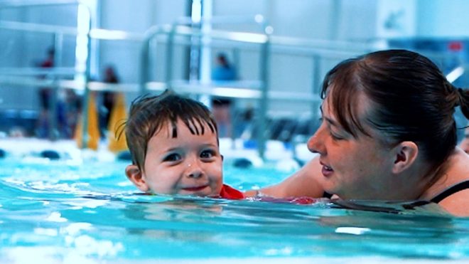 How swimming lessons benefit children beyond the pool
